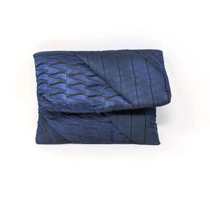 Recycled men's ties made into a silk clutch